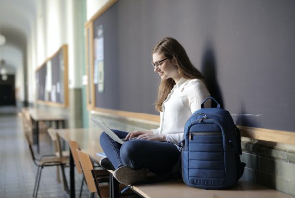 teen girl using computer