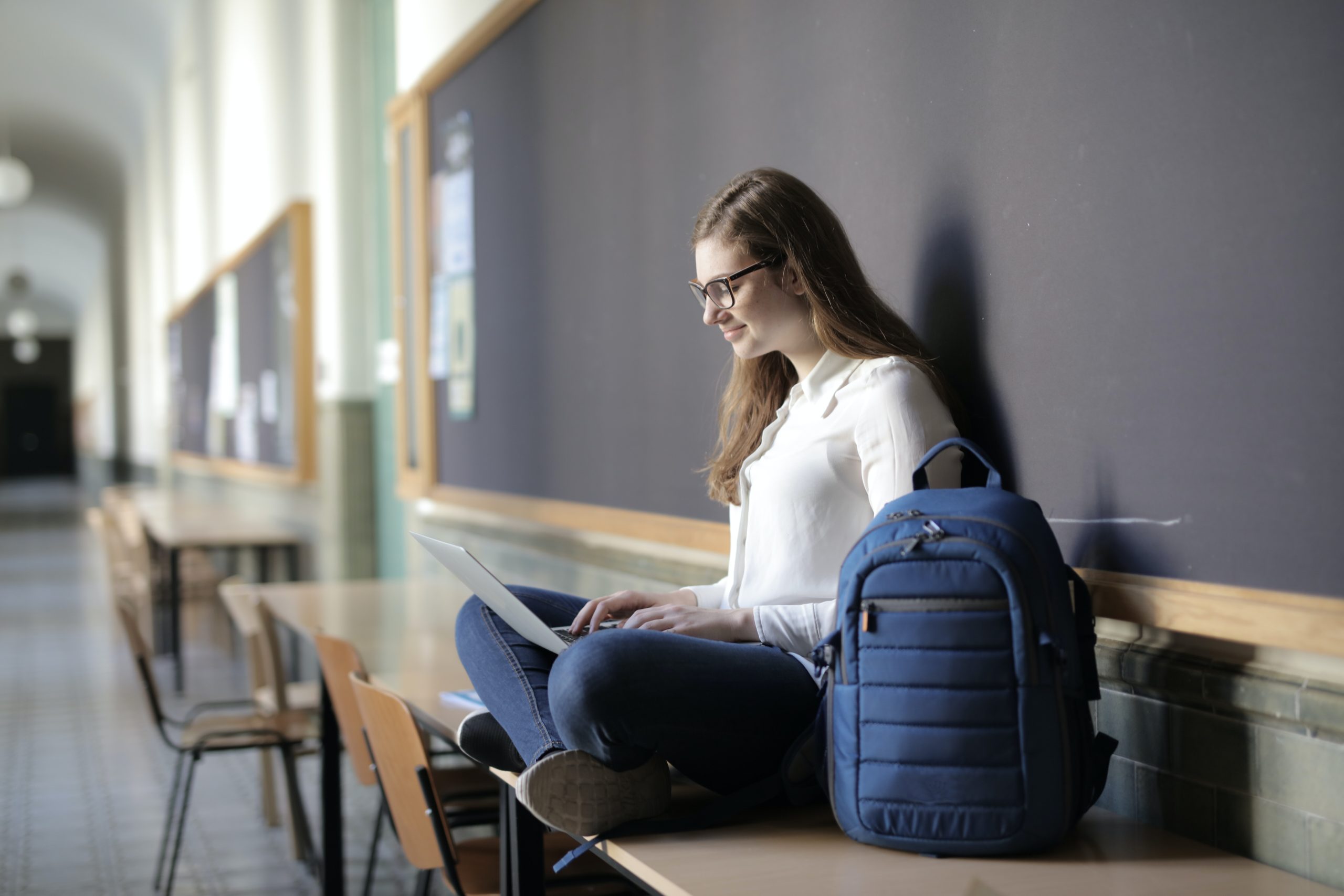 teen girl using computer